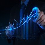businessman hand working with new modern computer and business s